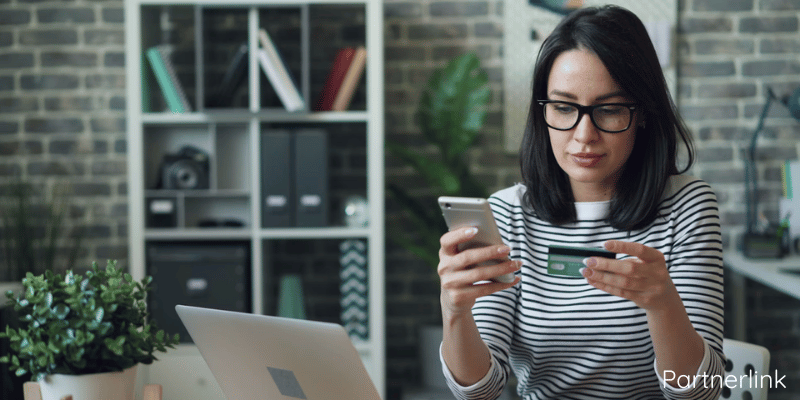 https://unsplash.com/photos/a-woman-sitting-at-a-table-looking-at-her-cell-phone-1JnN9QhmTGU